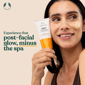 The Body Shop microdermabrasion being massaged onto cheek for renewed skin