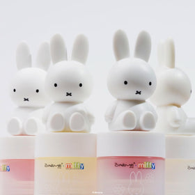 Swatches of Magnificent Marshmallow on skin from The Crème Shop showing sheer tint and glow