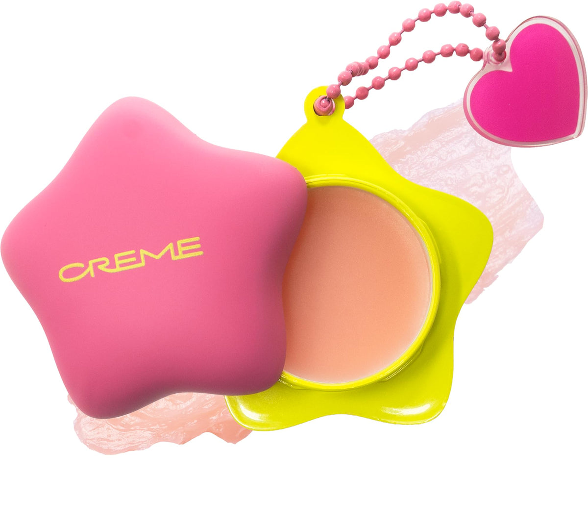 The Crème Shop front packaging showing cute keychain and compact balm