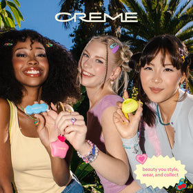 The Crème Shop on a desk as a lifestyle accessory and daily moisturizer
