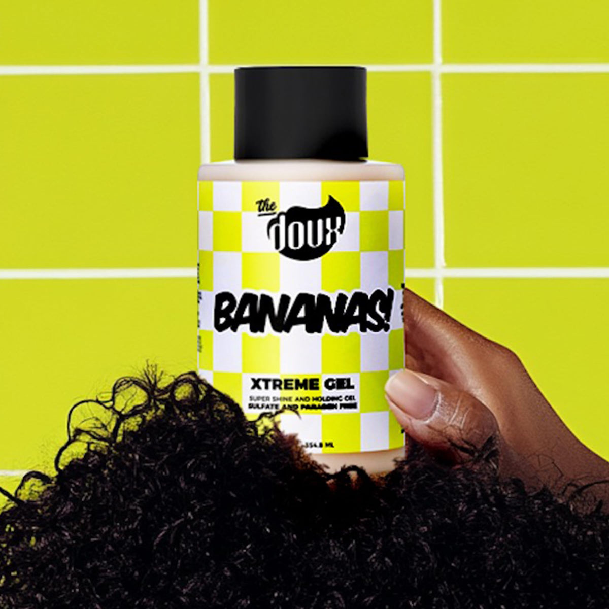 The Doux Bananas 12oz size comparison beside common items to show scale and value for frequent stylers
