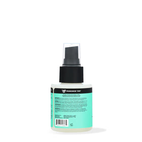 The Doux close-up nozzle with spray mist demonstrating easy application