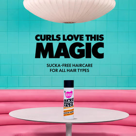 The Doux creamy shampoo texture demonstrating rich slip