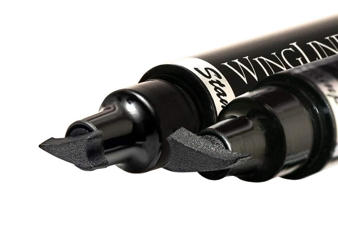 the flick stick size comparison held in hand to show portable travel-friendly design