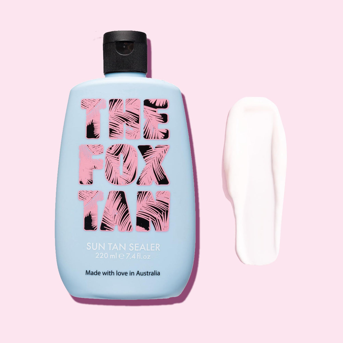 The Fox Tan next to a water bottle for scale showing 220mL size portability benefit