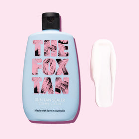 The Fox Tan next to a water bottle for scale showing 220mL size portability benefit