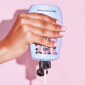 The Fox Tan texture on hand demonstrating lightweight lotion and quick-absorb benefit