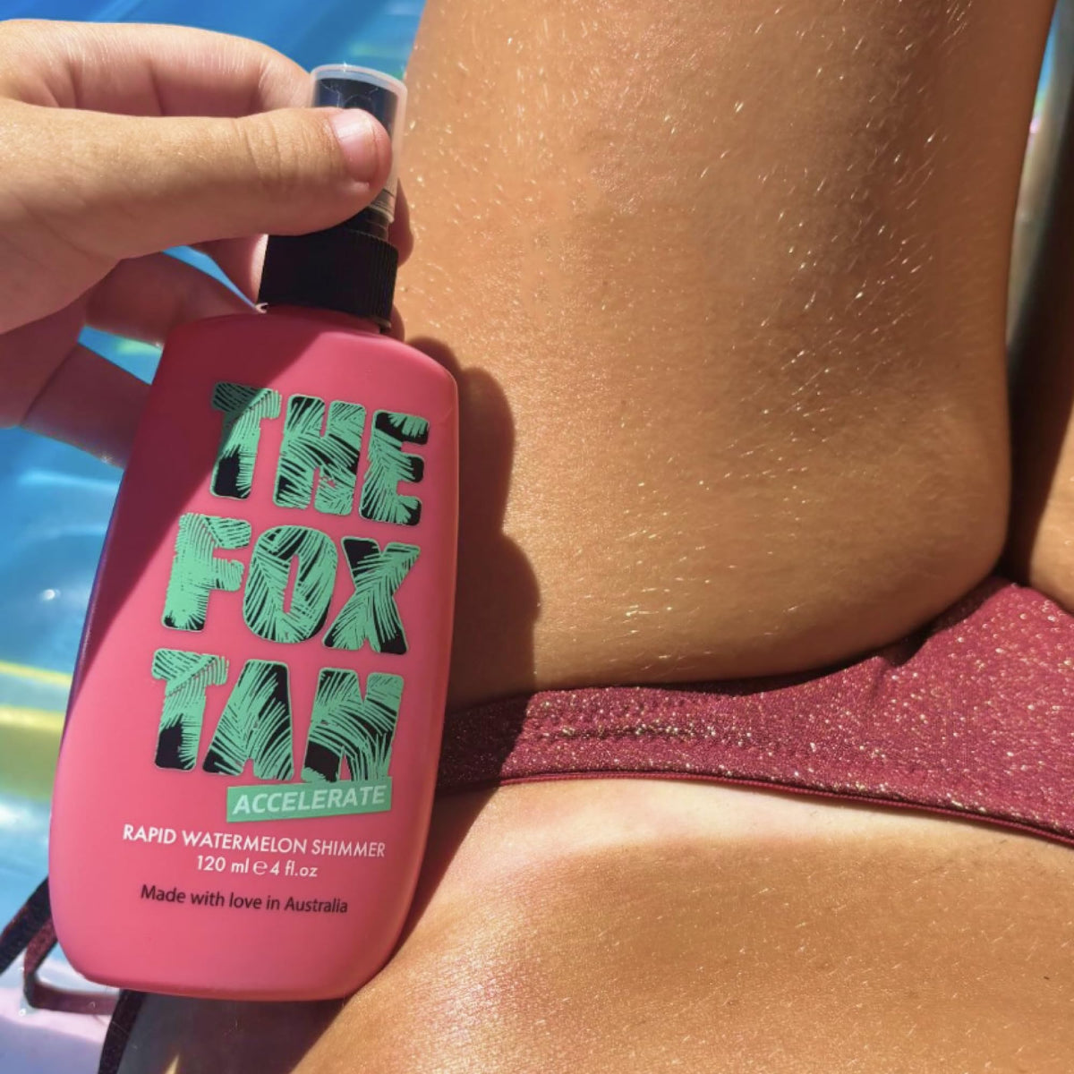 Texture detail of spray droplets showing The Fox Tan fine formula for smooth finish
