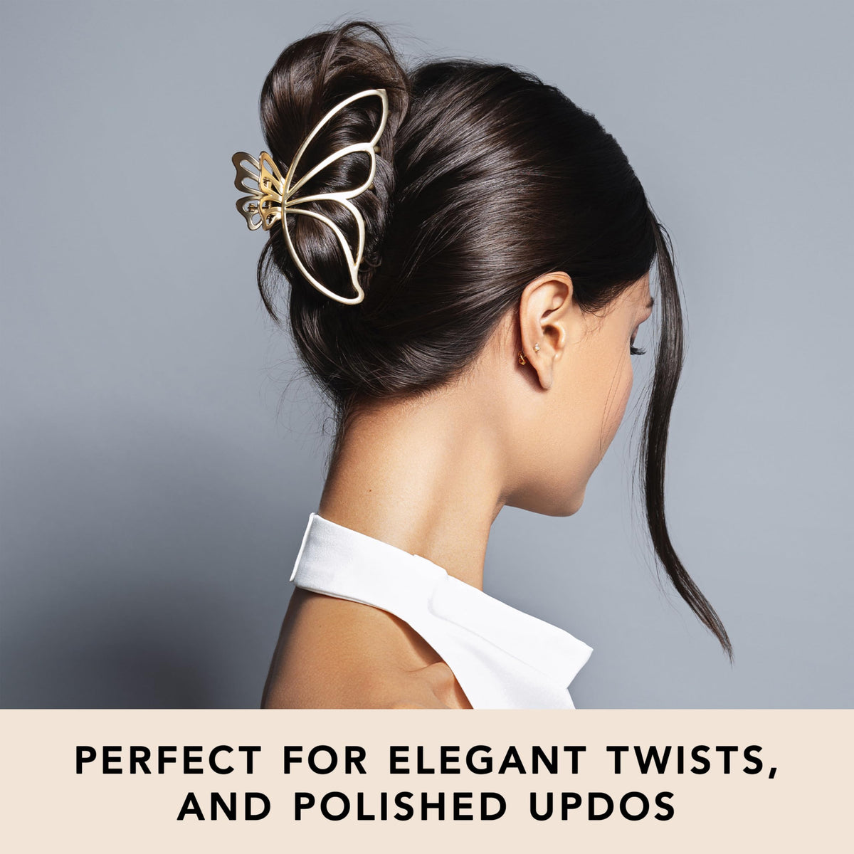 The Hair Edit clip in use securing a twisted updo, offering daylong hold
