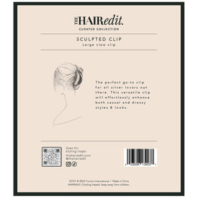 The Hair Edit placed on dresser beside outfit showing accessory-ready, polished look