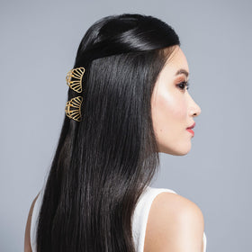 The Hair Edit close-up of shell texture and soft gold metal finish