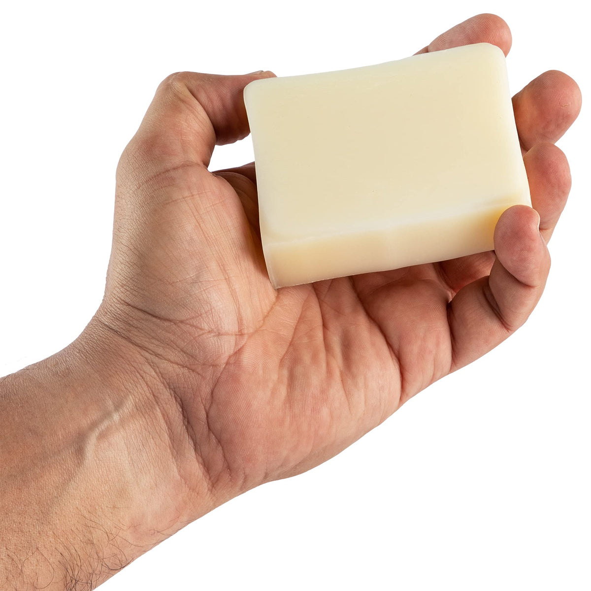 The Healthy Porcupine 4 oz bar next to a coin for clear size perspective