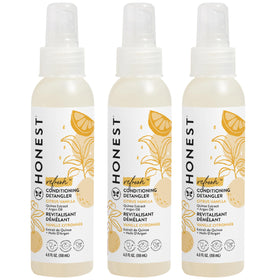 The Honest Company bottle front view showing Refresh scent and benefits