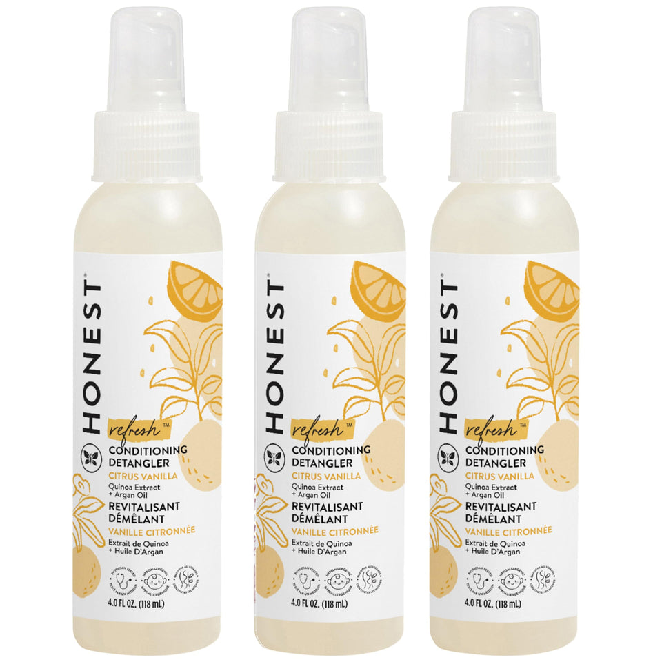 The Honest Company bottle front view showing Refresh scent and benefits