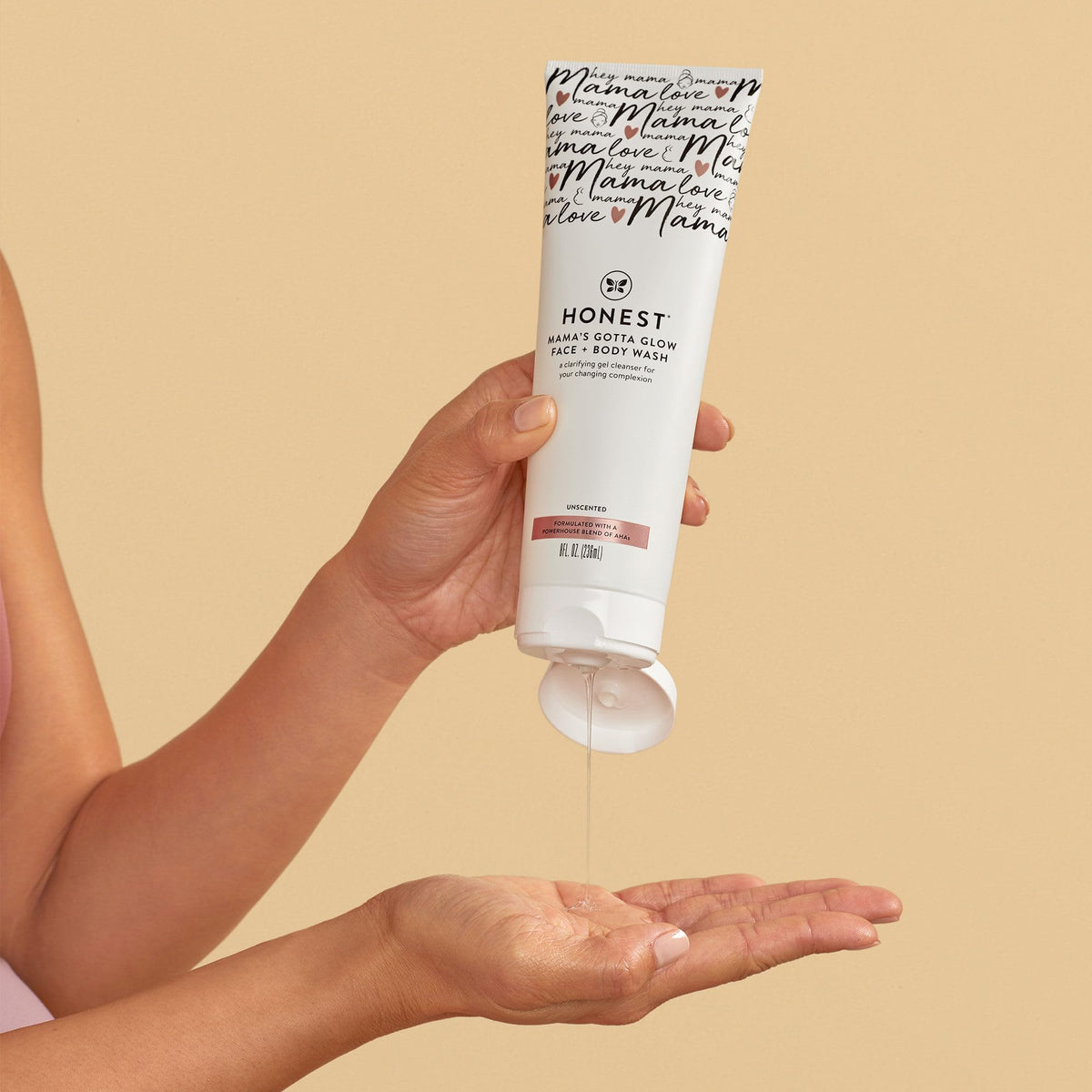 The Honest Company gel lather on hand demonstrating gentle exfoliating foam