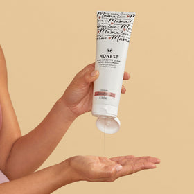 The Honest Company gel lather on hand demonstrating gentle exfoliating foam