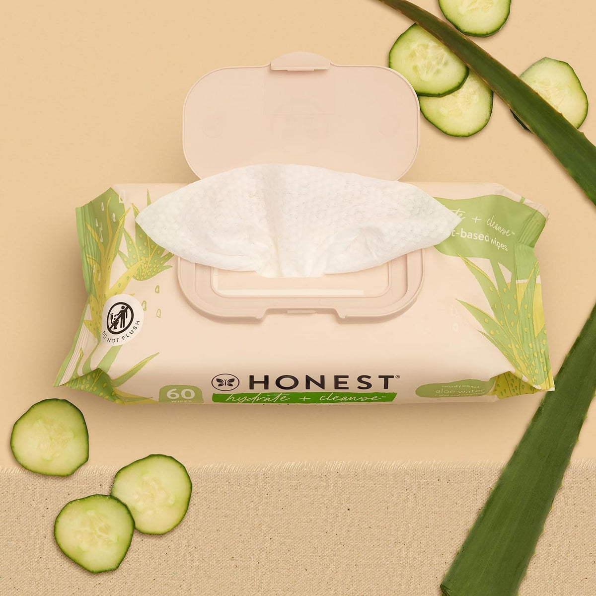 Close-up texture of The Honest Company wipe showing thickness and softness benefit