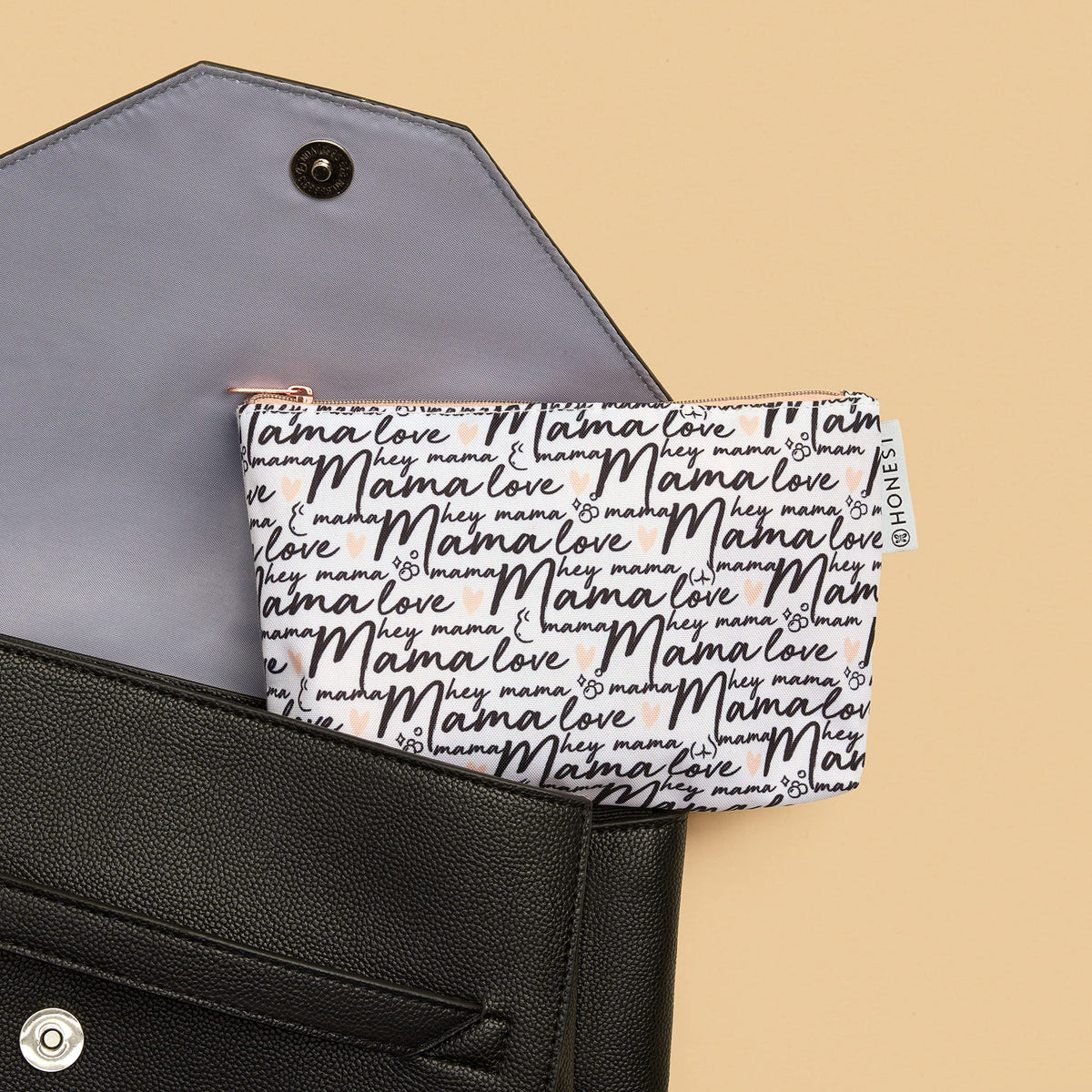 The Honest Company kit held in hand to show travel sizes and portability benefit