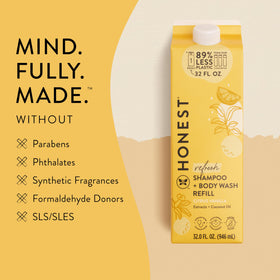 Size comparison of The Honest Company 32 oz refill next to a 10 oz bottle to show value
