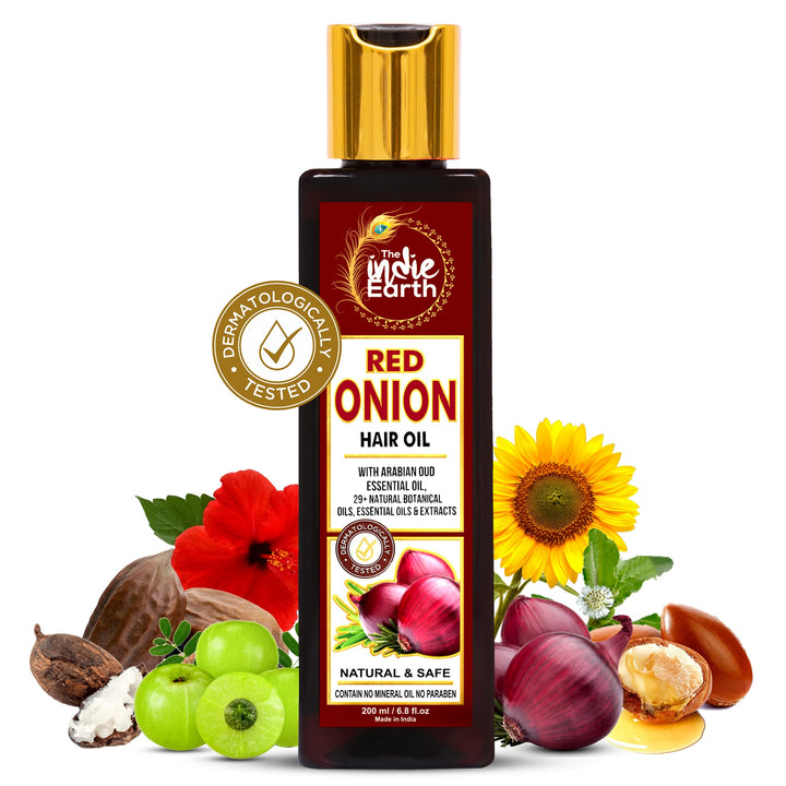 The Indie Earth front bottle shot showing red onion hair growth oil and clear benefits
