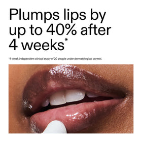 The INKEY List balm applied on lips showing subtle pink tint and volume