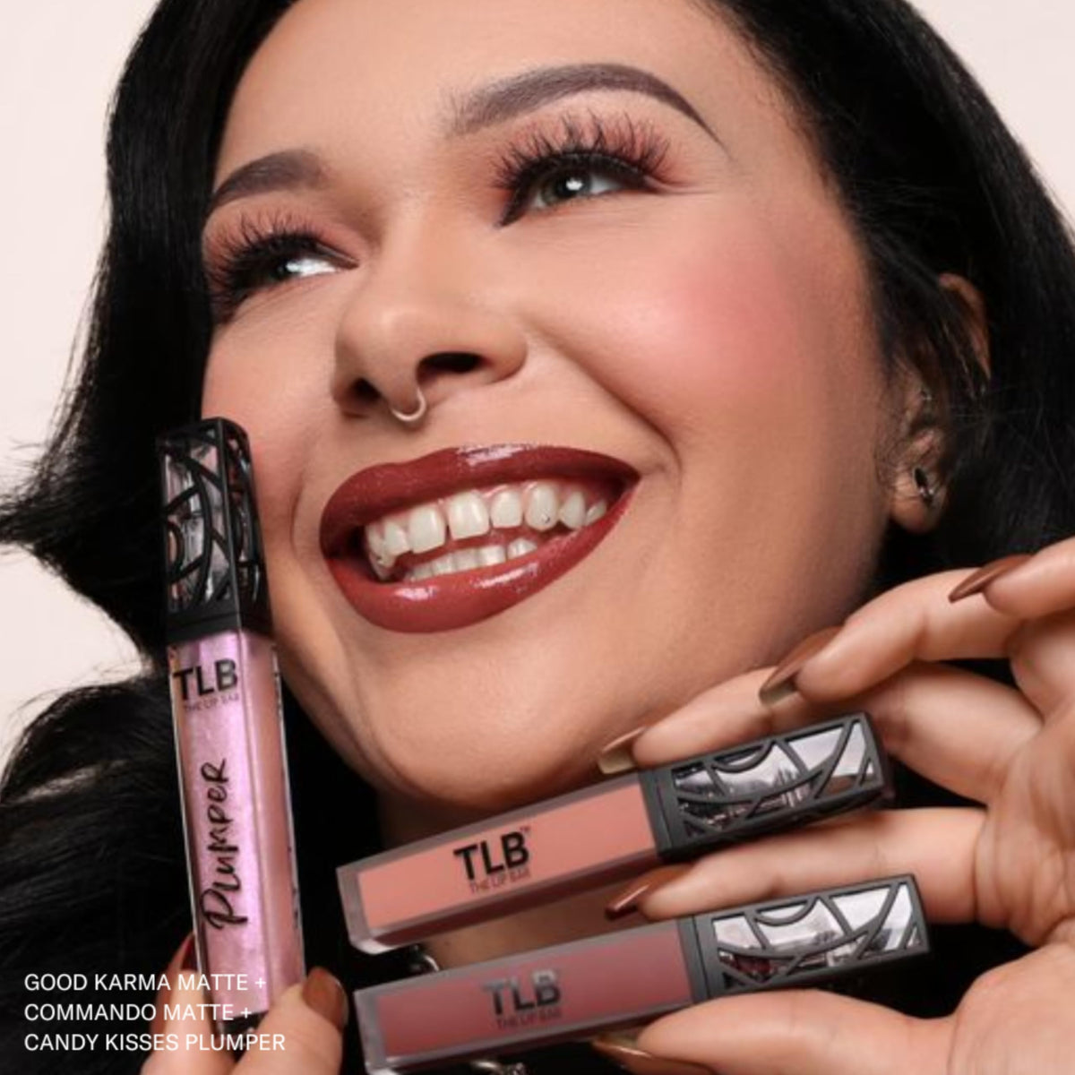 The Lip Bar Commando with jojoba oil and vitamin E visuals highlighting conditioning