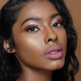 The Lip Bar Curlfriend layered with gloss showing glossy option and shine boost