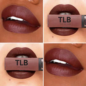 The Lip Bar applicator close-up showing precise wand and smooth application