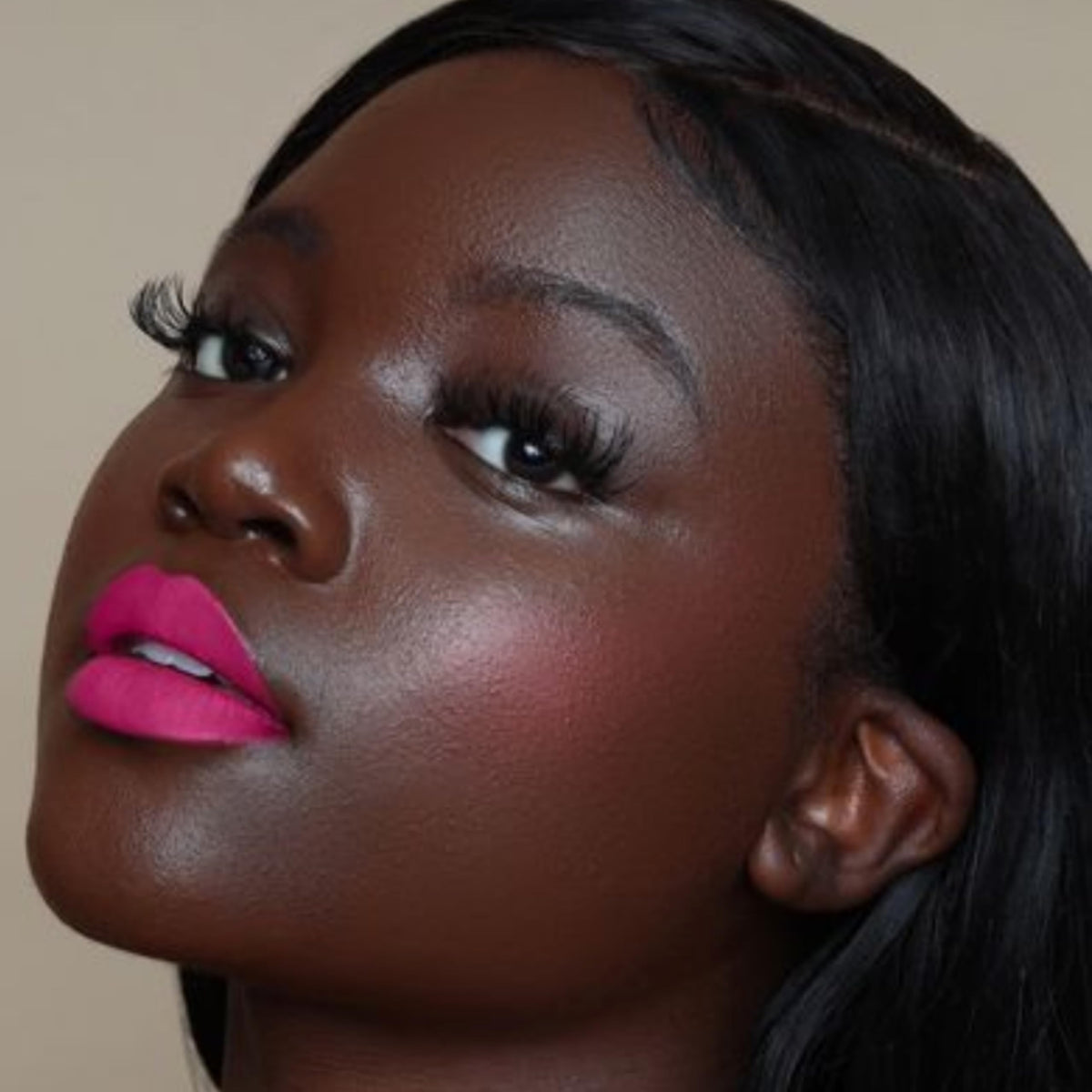 the lip bar fuchsia cap and label detail highlighting branding and ingredient-conscious benefit