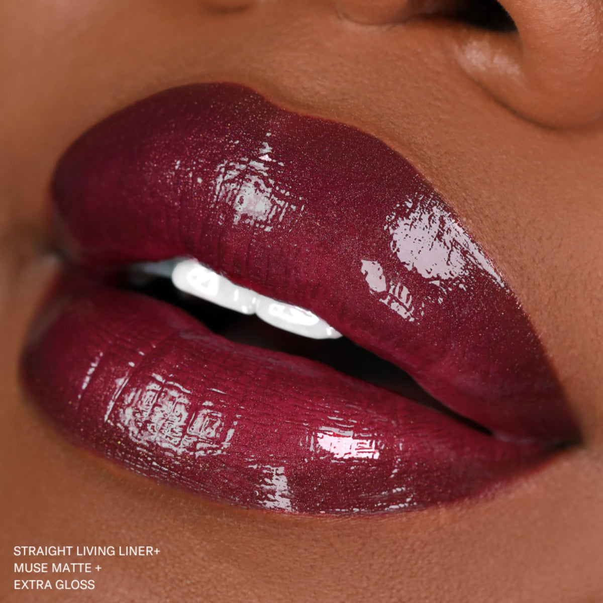 Swatch of The Lip Bar Muse on forearm, rich pigment and even matte finish