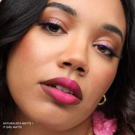 The Lip Bar Naturalista on model smile illustrating wearable soft-brown effect