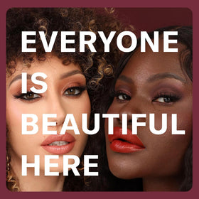 The Lip Bar Savage worn on model showing bold red-brown color and long-lasting effect