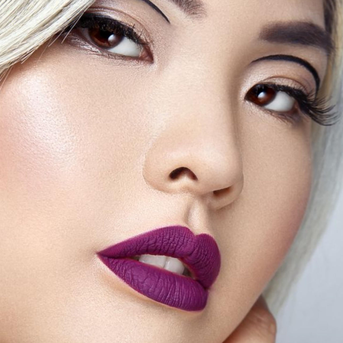 The Lip Bar Prima Donna paired with gloss showing versatility and shine option