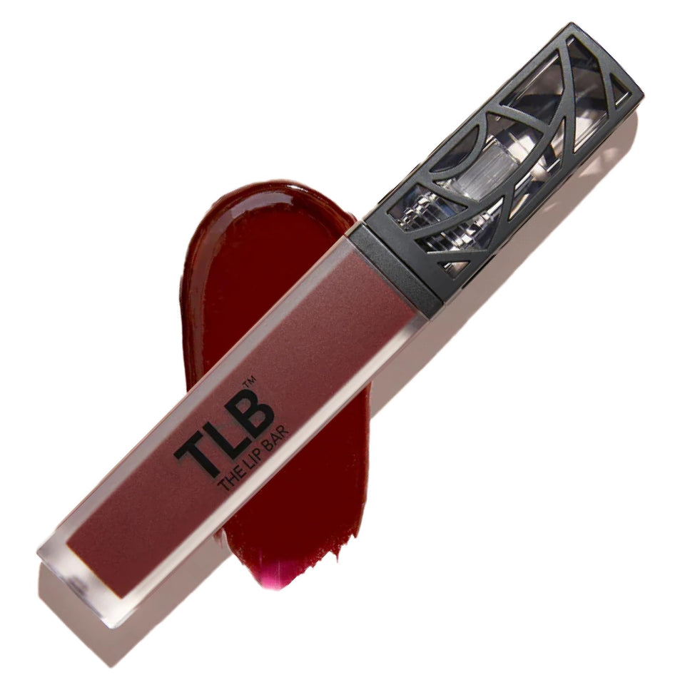 The Lip Bar Rebel front packaging showing deep burgundy and product benefit