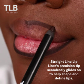 The Lip Bar Straight Shooter texture swatch on skin revealing rich pigment and matte finish