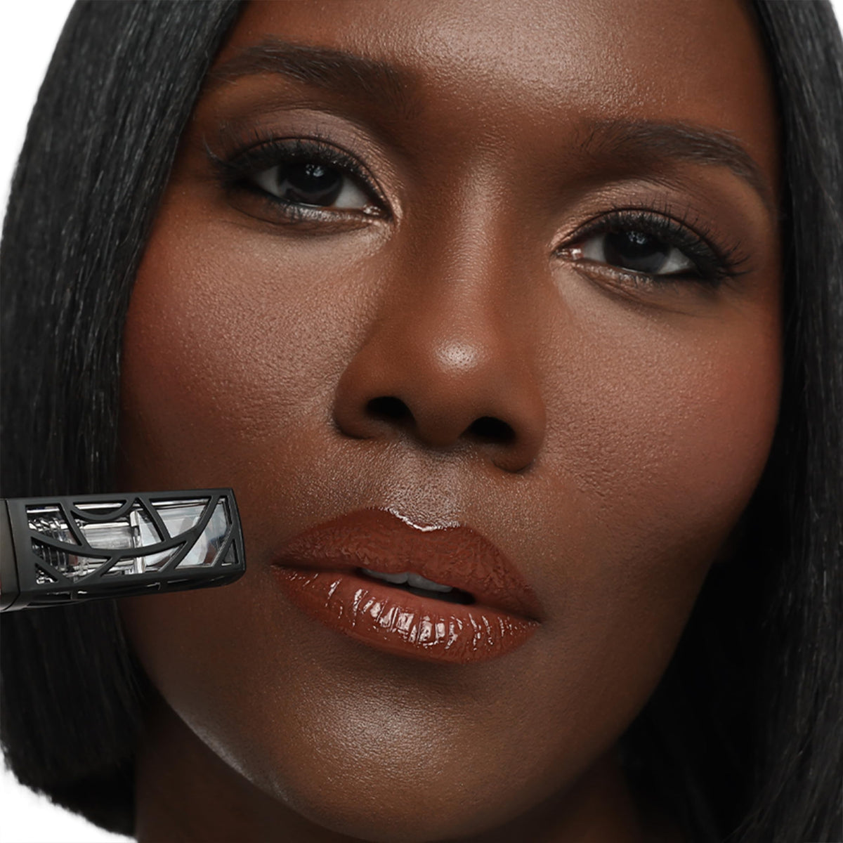 The Lip Bar ingredients label listing argan oil, olive oil, vitamin E