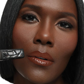 The Lip Bar ingredients label listing argan oil, olive oil, vitamin E