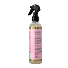 Label close-up on The Mane Attraction bottle showing ingredient highlights