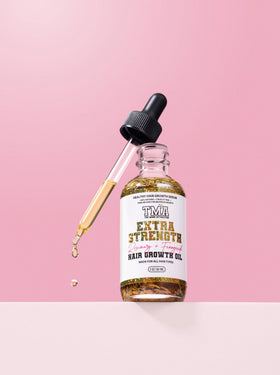 The Mane Attraction bottle on bathroom shelf suggesting daily use