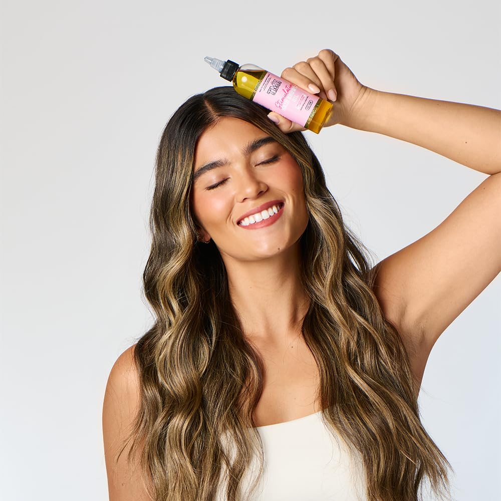 The Mane Attraction scalp application on roots, calms dryness and soothes irritation