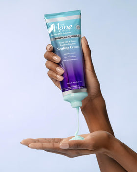 The Mane Choice in hand showing 8 ounce size for easy reference