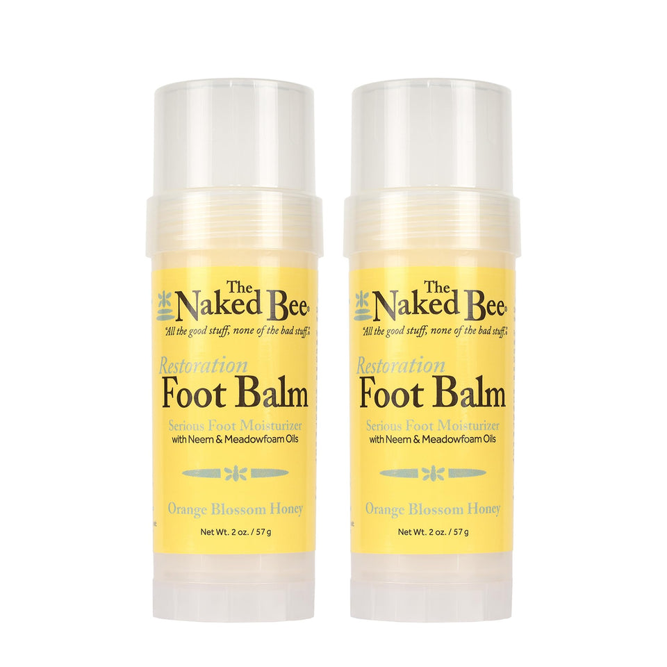 The Naked Bee front packaging showing two 2 oz balms and benefits