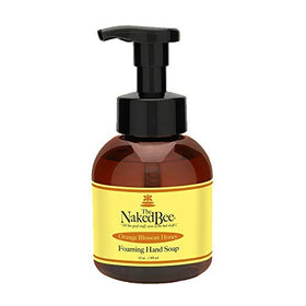 The Naked Bee front bottle showing orange blossom honey scent and 12 oz size benefit