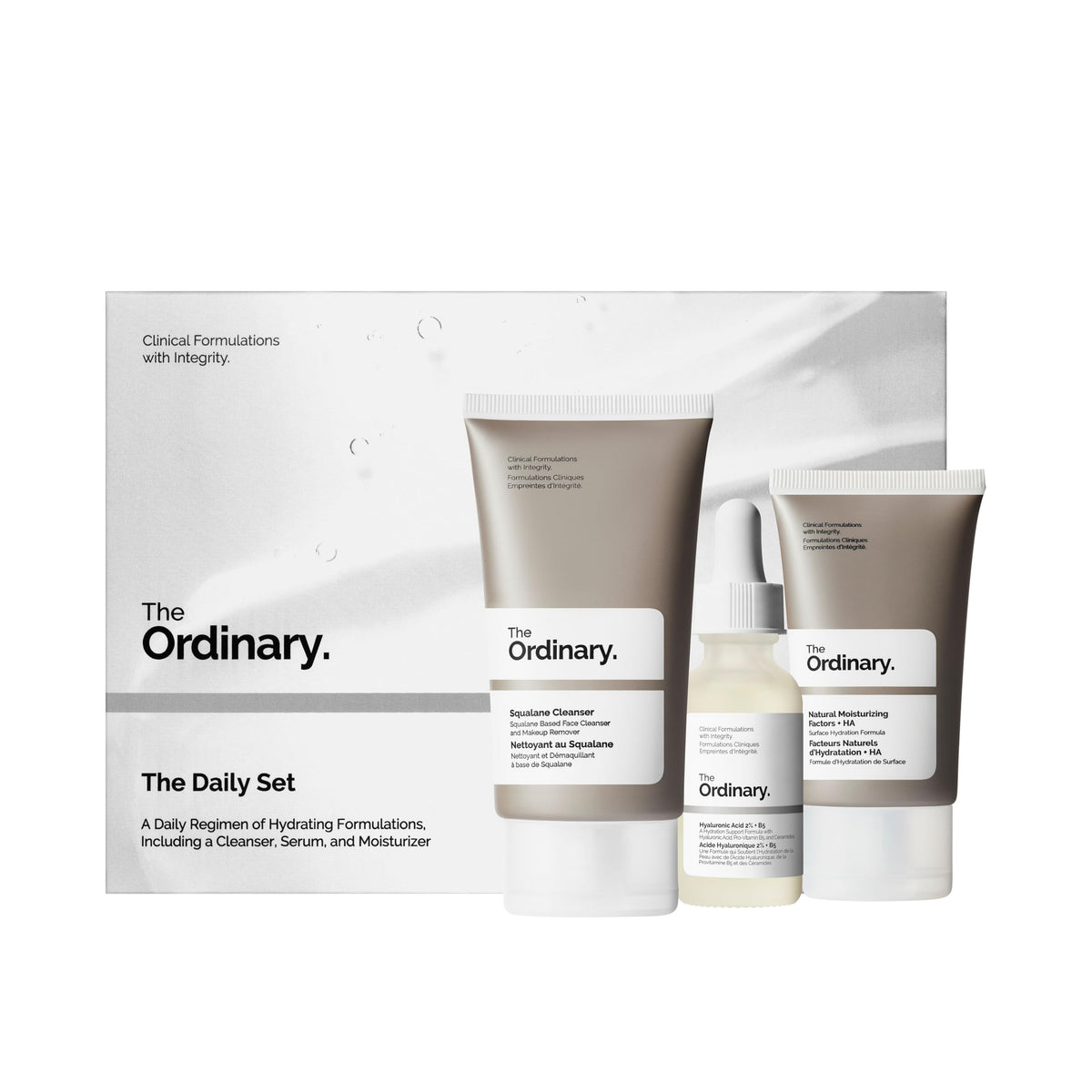 The Ordinary daily set front packaging showing three products and clear routine benefits