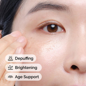 The Ordinary eye serum in use being gently patted under the eye for smoother skin