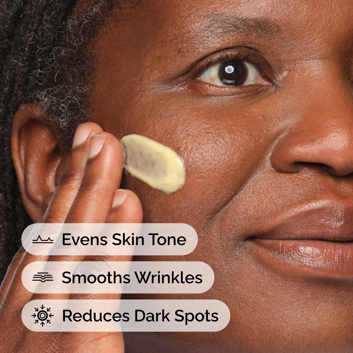 The Ordinary in-hand application showing pea-sized dose on fingertip, precise control