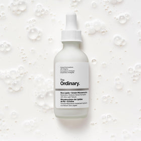 The Ordinary bottle styled on bathroom shelf to suggest everyday skincare routine