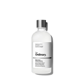 The Ordinary bottle beside common items to show 3.4 fl oz size and travelability