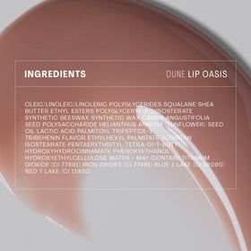 The Outset open tube showing glossy balm filling applicator for precise use