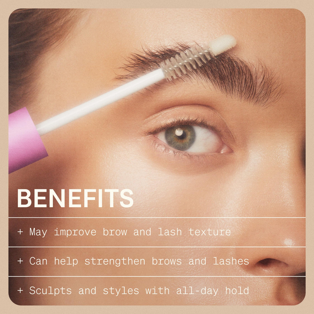 Model applying serum to lashes with wand tip for subtle definition and conditioning
